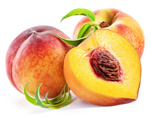 Ripe juicy peach half and two peaches with green leaves isolated on white background.