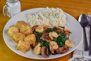 scallops with sauteed shrimp, spinach and mushrooms