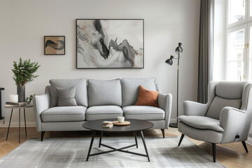 photo of grey sofa and recliner chair with plants in a scandinavian clean and minimalist living room apartment and design interior furniture