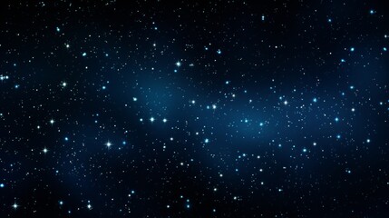 Fototapeta premium A close-up photo of a starry night sky, with the stars appearing as shimmering blue dots against a dark, velvety backdrop.