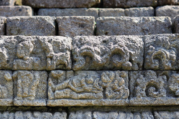 intricate reliefs at Jago Temple, capturing the artistry and cultural significance of this historic site, perfect for educational and creative projects