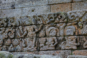 intricate reliefs at Jago Temple, capturing the artistry and cultural significance of this historic site, perfect for educational and creative projects