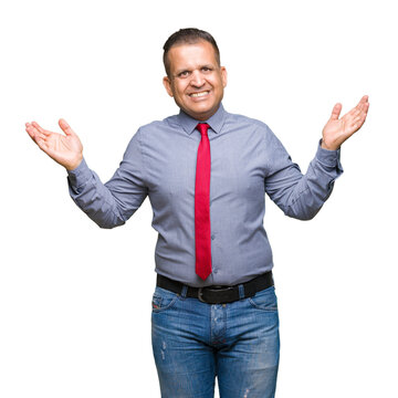 Middle age arab man wearing red tie over isolated background clueless and confused expression with arms and hands raised. Doubt concept.