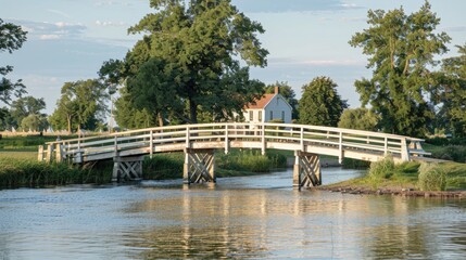 a colorful sunset , featuring green fields, an old windmill, and a small path leading to the mill along a canal reflecting the vibrant sky hues.