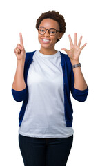 Young beautiful african american woman wearing glasses over isolated background showing and pointing up with fingers number six while smiling confident and happy.