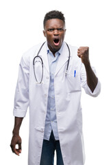 Young african american man wearing doctor coat annoyed and frustrated shouting with anger, crazy and yelling with raised hand, anger concept