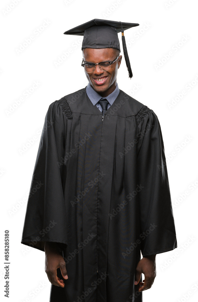 Sticker young graduated african american man over isolated background winking looking at the camera with sex