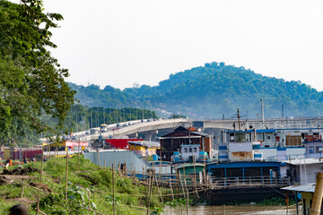 Boats anchored and a road by-pass on the banks of River Brahmaputra of Assam_1 guwahati city