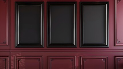An elegant office with a burgundy wall, featuring three medium-sized empty black frames evenly...