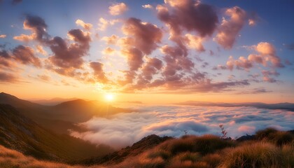 Fototapeta premium sunset over the mountains with mist 
