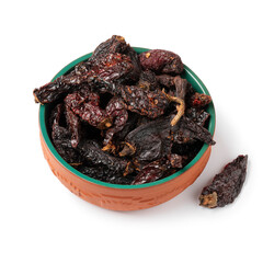 Bowl with smoked Mexican chile chipotle Morita pepper isolated on white background close up