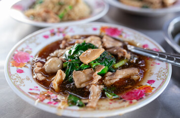 Rad Na: A Thai dish of stir-fried wide rice noodles covered in a thick, savory gravy sauce, usually served with meat and vegetables. Asian food culture