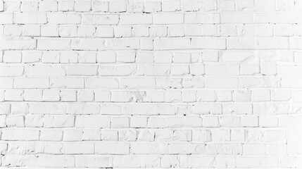 Fototapeta premium A white brick wall with a few cracks. The wall is very plain and simple. It is a very basic and simple design