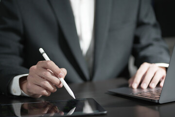 young business managers crew working with new startup project. labtop on wood table, typing keyboard, texting message, analyze graph plans.