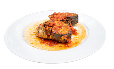 Ca chien sot ca or fried fish with tomato sauce, a Vietnamese meal. Pomfret or mackerel is fried then mixed with tomato sauce. A homemade food. Serve with plain rice and soy sauce. 