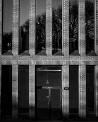 Black and white photos of brick buildings around Helsinki