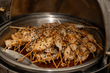 Teriyaki chicken skewers. Traditional Japanese food - skewer yakitori with chicken hearts and teriyaki sauce.
