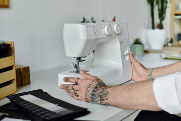 tailor carefully adjusts a sewing machine in his atelier, transforming old clothes into something new.