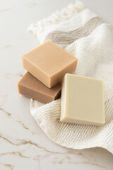 soap bars and soap on marble background