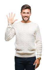 Young handsome man wearing winter sweater over isolated background showing and pointing up with fingers number five while smiling confident and happy.