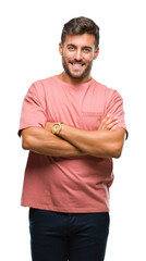 Young handsome man over isolated background happy face smiling with crossed arms looking at the camera. Positive person.