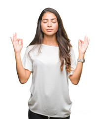 Young beautiful arab woman over isolated background relax and smiling with eyes closed doing meditation gesture with fingers. Yoga concept.