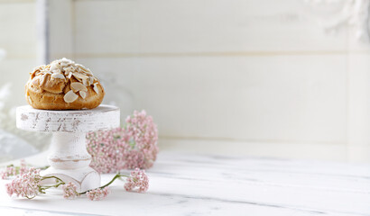 traditional choux pastry eclair dessert on a plate
