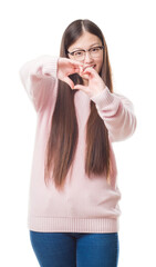 Young Chinese woman over isolated background wearing glasses smiling in love showing heart symbol and shape with hands. Romantic concept.