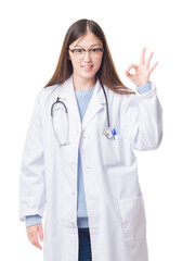 Young Chinese doctor woman over isolated background smiling positive doing ok sign with hand and fingers. Successful expression.