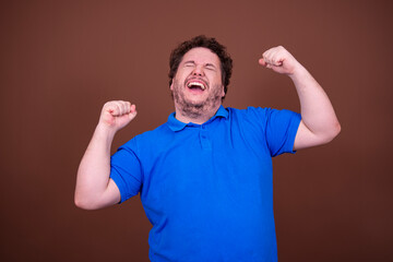 Funny fat man and different emotions. Brown background.