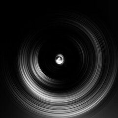 Black and white radial motion effect. Abstract rounded background. Grayscale curves and sphere. Monochrome gradient rings and circles wallpaper. Colorless texture backdrop and banner.