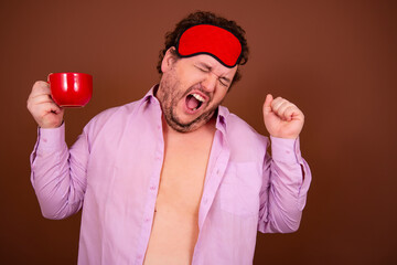 Early morning fresh gossip. Funny fat man drinking coffee. Brown background.