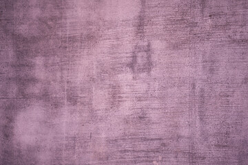 Interesting texture of a pink concrete wall