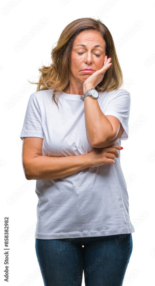 Sticker Middle age senior hispanic woman over isolated background thinking looking tired and bored with depression problems with crossed arms.