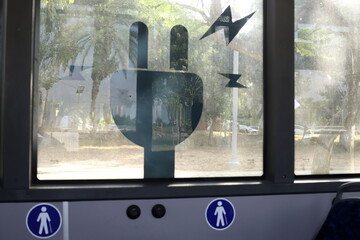 Body parts of a city bus close-up.