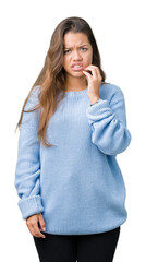 Young beautiful brunette woman wearing blue winter sweater over isolated background touching mouth with hand with painful expression because of toothache or dental illness on teeth. Dentist concept.