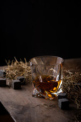 Glass of whiskey and stones