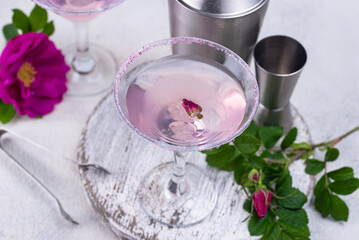 Pink martini cocktail with rose syrup
