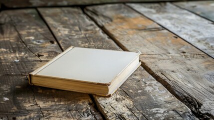 Tranquil White Book on Rustic Wooden Table: A Study in Simplicity