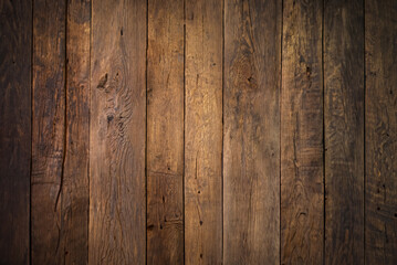 Fototapeta premium Rustic weathered wooden background. Center light area. Textured backdrop.