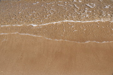 waves on the sandy Lovrecina beach , island Brac, Croatia