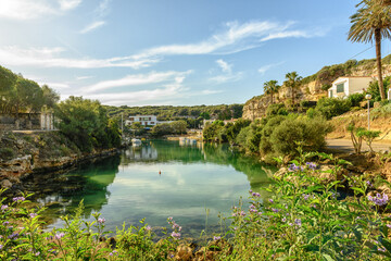 Fototapeta premium Serene Cala Sant Esteve Harbor, Menorca