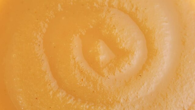 Homemade Applesauce puree circle rotation close up