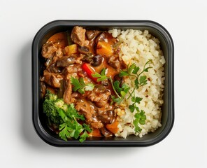 Beef Stew with Rice and Vegetables in a Black Container