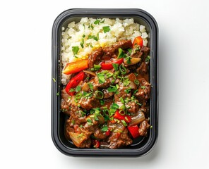 Beef and Vegetable Stir-Fry with Rice in a Takeout Container
