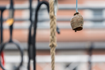 A bell of a hanging obstacle in an obstacle course race