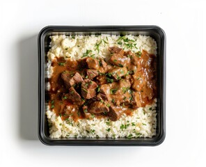Beef Stew with Rice in a Black Container