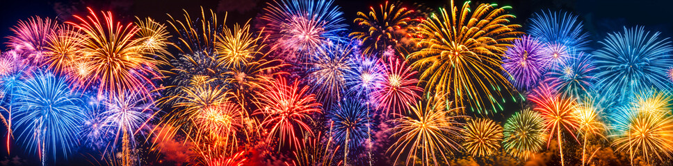 Colorful fireworks display panorama, wide banner background