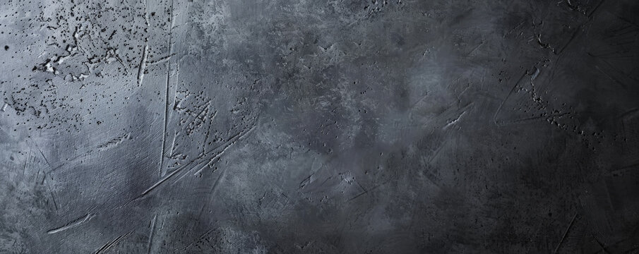 Minimalist grey concrete background with smooth texture and subtle imperfections. The modern, industrial look adds a sleek, contemporary touch to any design element, ideal for sophisticated themes