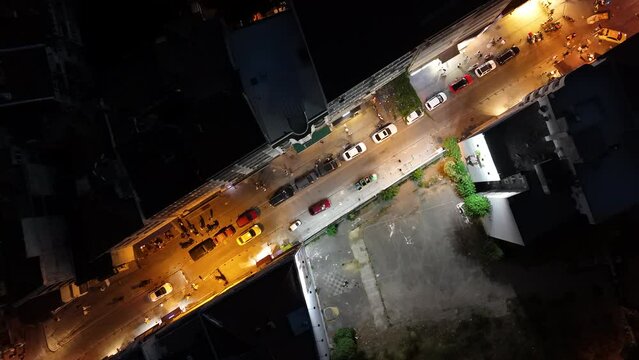 cross video, Sunset bird's eye view from aerial drone shooting of Kadikoy Port, Haydarpasa, harem and Bosphorus in the background, walking cars, Istanbul Kadikoy